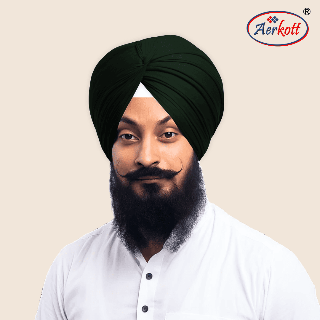 Man wearing a military green turban with Aerkott logo in the corner