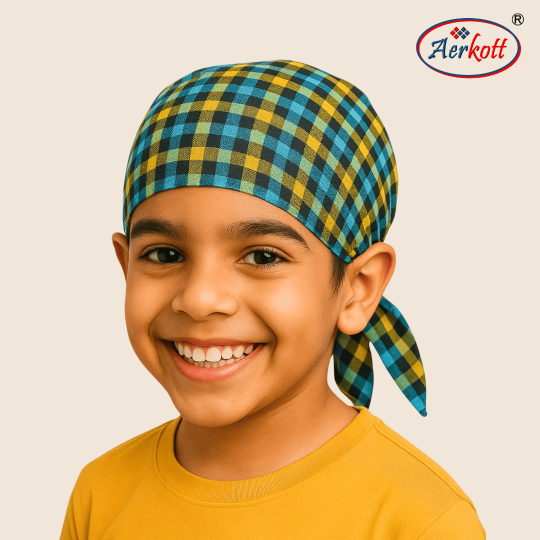 Child wearing a blue and yellow checkered headscarf with Aerkott logo in the corner