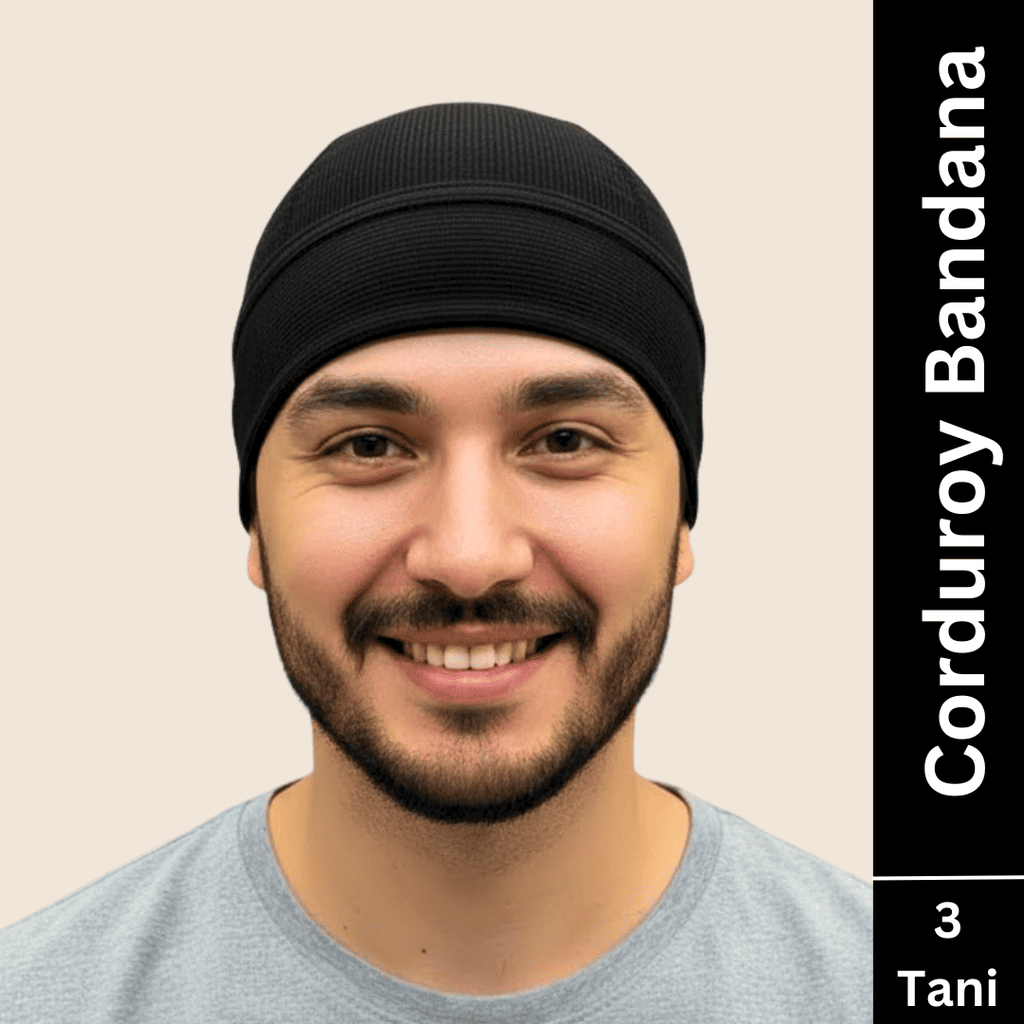 a man wearing 3 tani corduroy bandana in black color