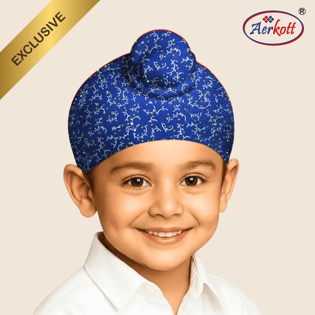 Child wearing a blue patterned turban with Aerkott logo on a beige background