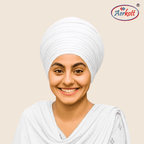 Person wearing a white mulmul malmal turban with AERKOTT logo in the corner