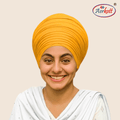 Woman wearing a yellow mulmul malmal turban with AERKOTT logo in the corner