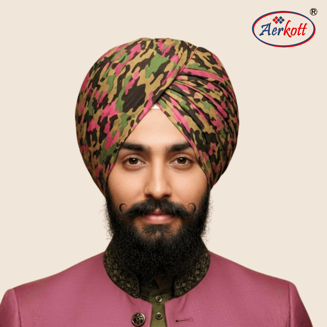 Man wearing a colorful turban with Aerkott logo in the corner