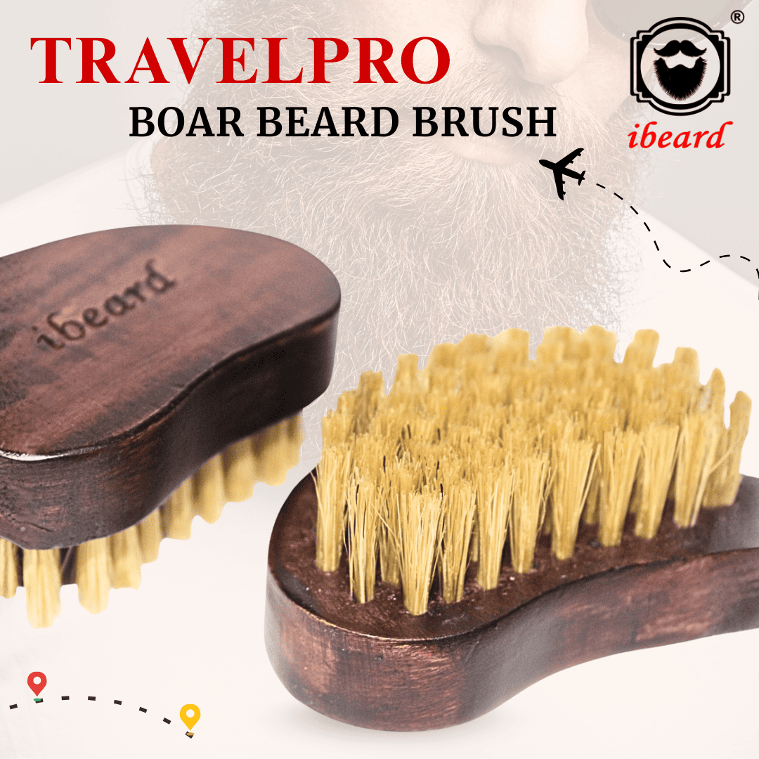 TravelPro boar beard brush with wooden handle and bristles, brand 'ibeard' visible.
