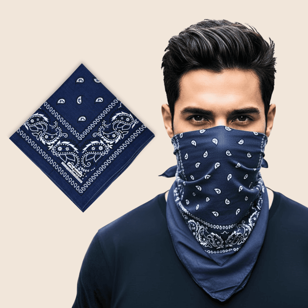 Man wearing a navy blue bandana with white patterns, next to a matching bandana on a beige background.