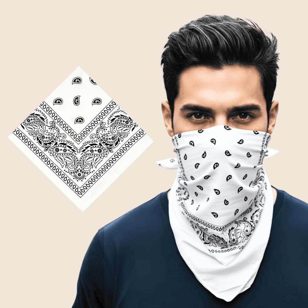 Man wearing a white bandana with black patterns, next to a folded bandana on a beige background.