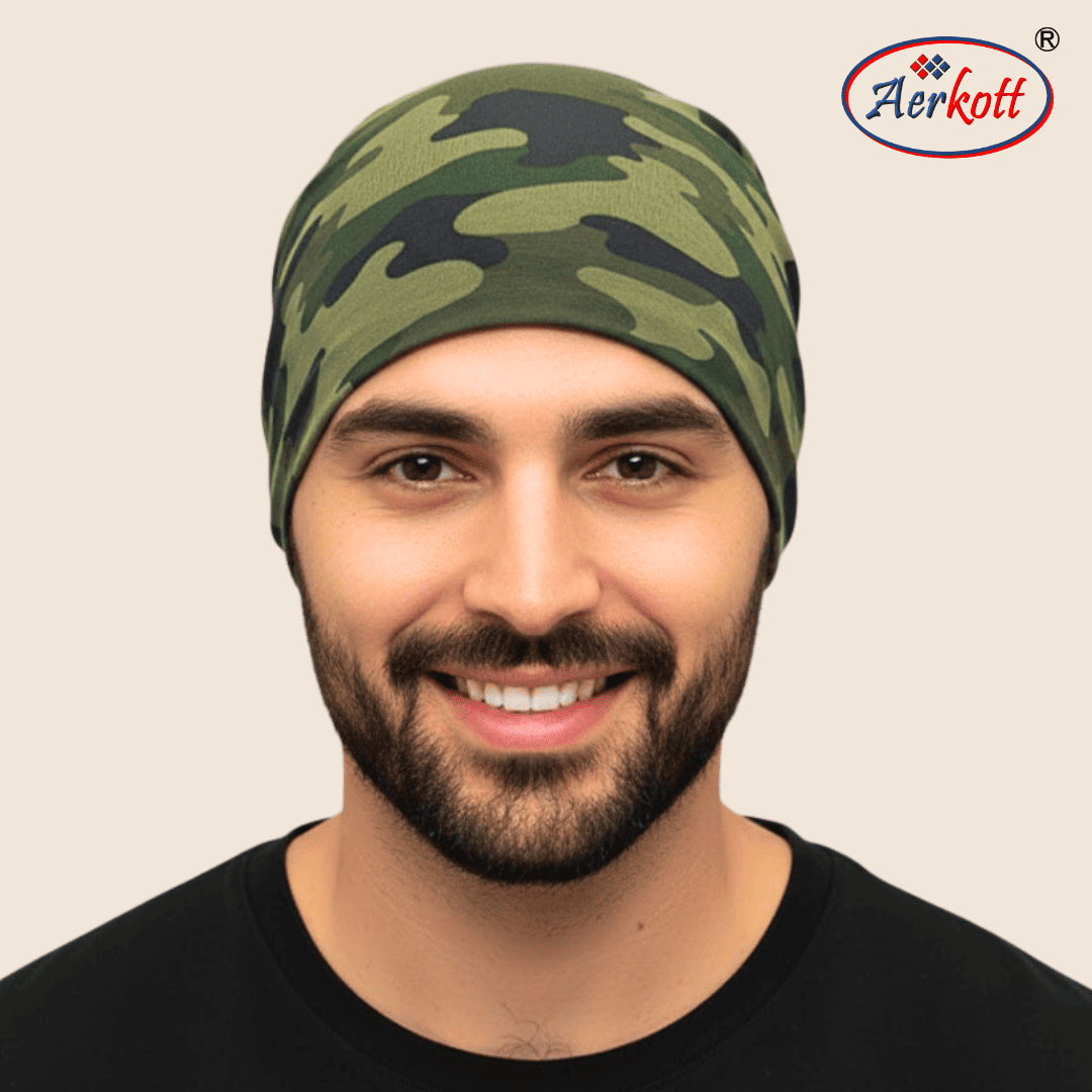 Man wearing a camouflage headband with Aerkott logo in the corner