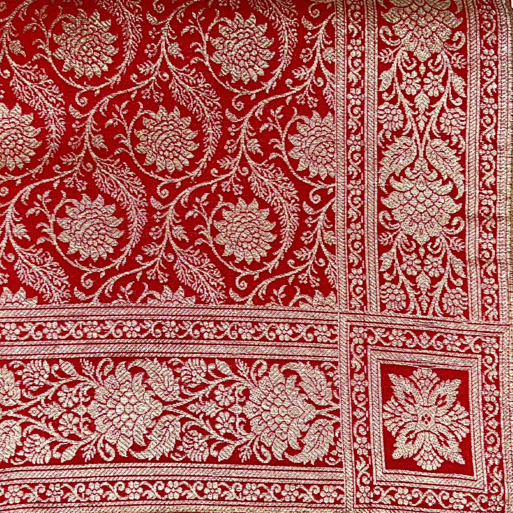 Jot Noor Rumala Sahib with traditional gold zari floral design and woven border