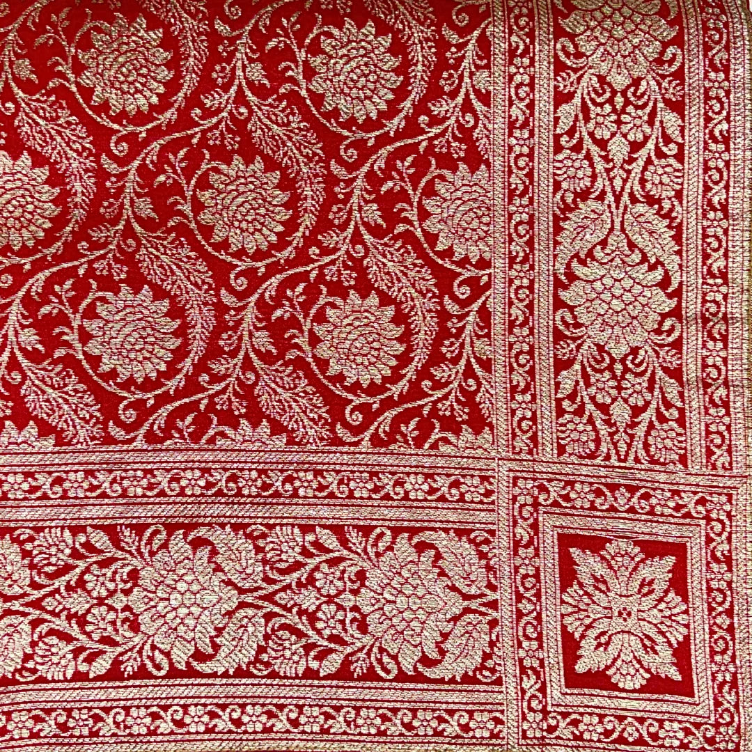 Jot Noor Rumala Sahib with traditional gold zari floral design and woven border