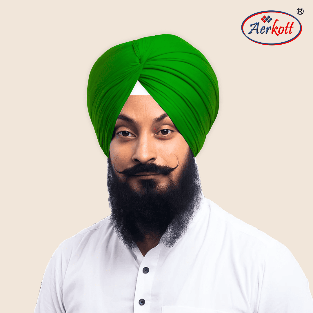 Man wearing a parrot green turban with AERKOTT logo in the corner