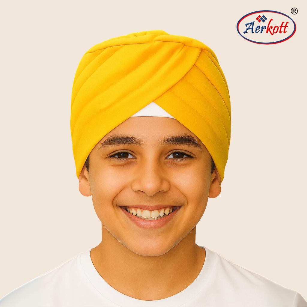 Child wearing a yellow turban with Aerkott logo in the corner
