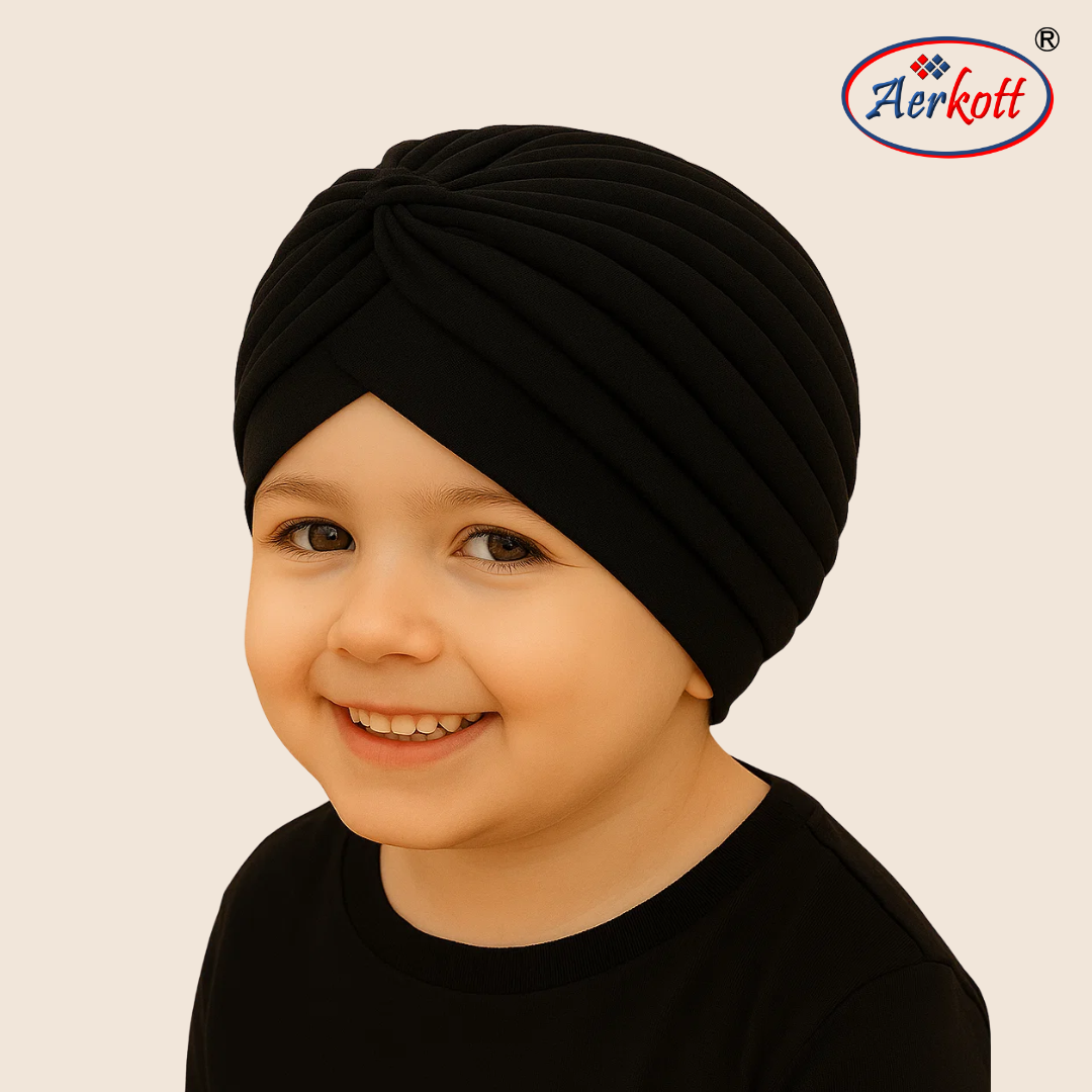 Child wearing a black turban with Aerkott logo in the corner