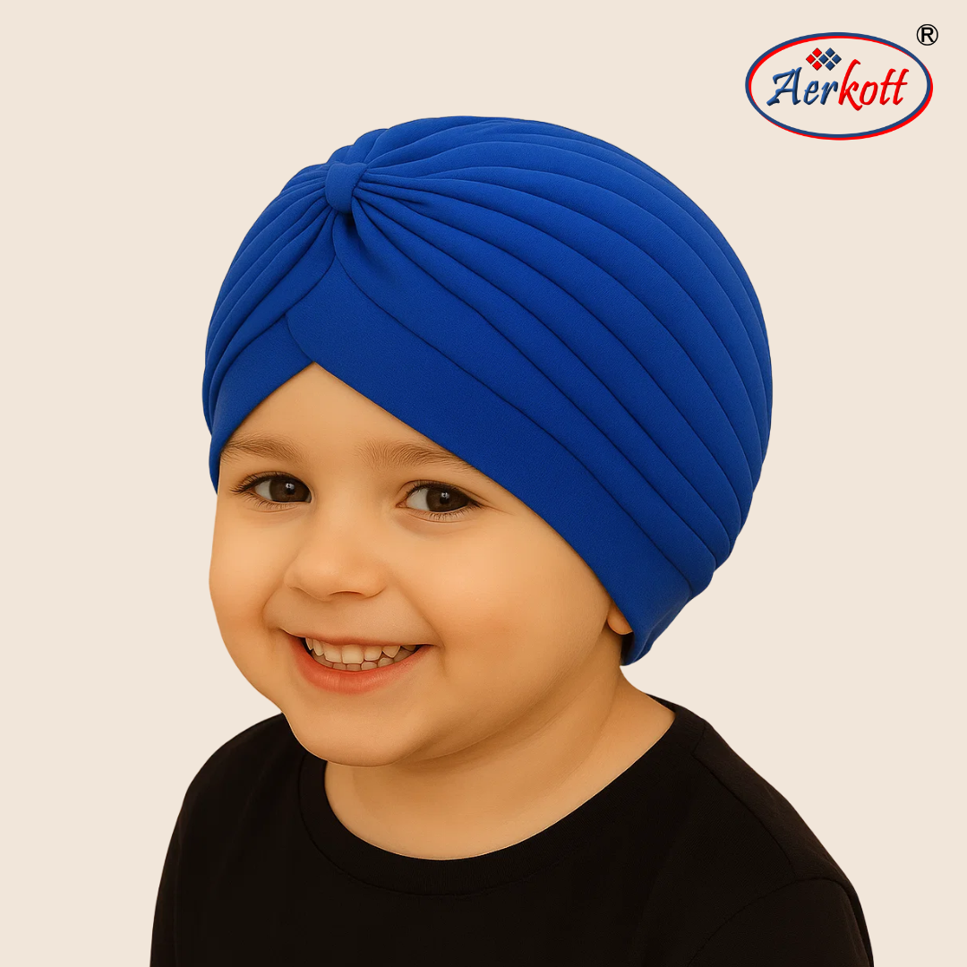 Child wearing a blue turban with Aerkott logo in the corner