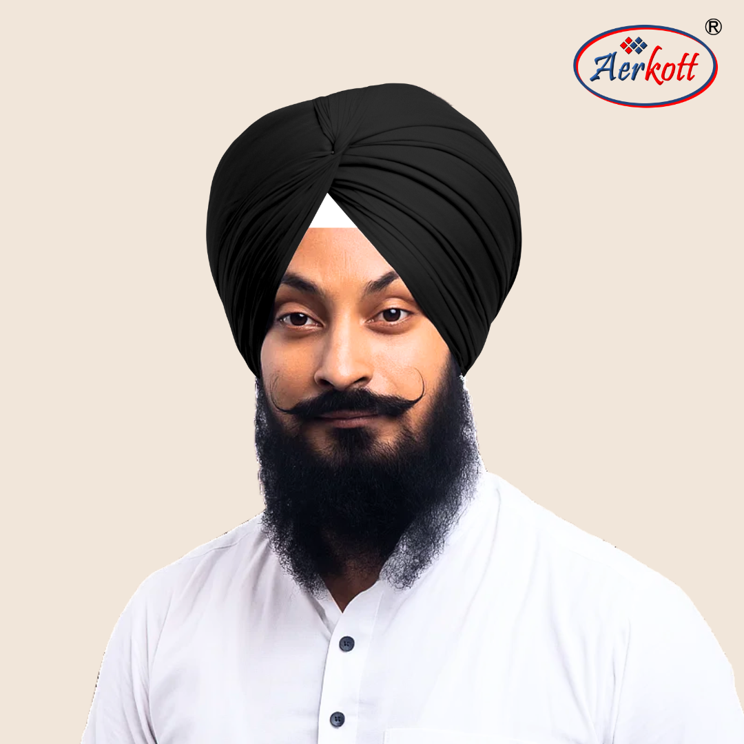 Man wearing a black turban with Aerkott logo in the corner