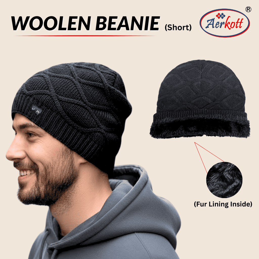 Black woolen beanie with fur lining inside, worn by a man, on a beige background with Aerkott branding.