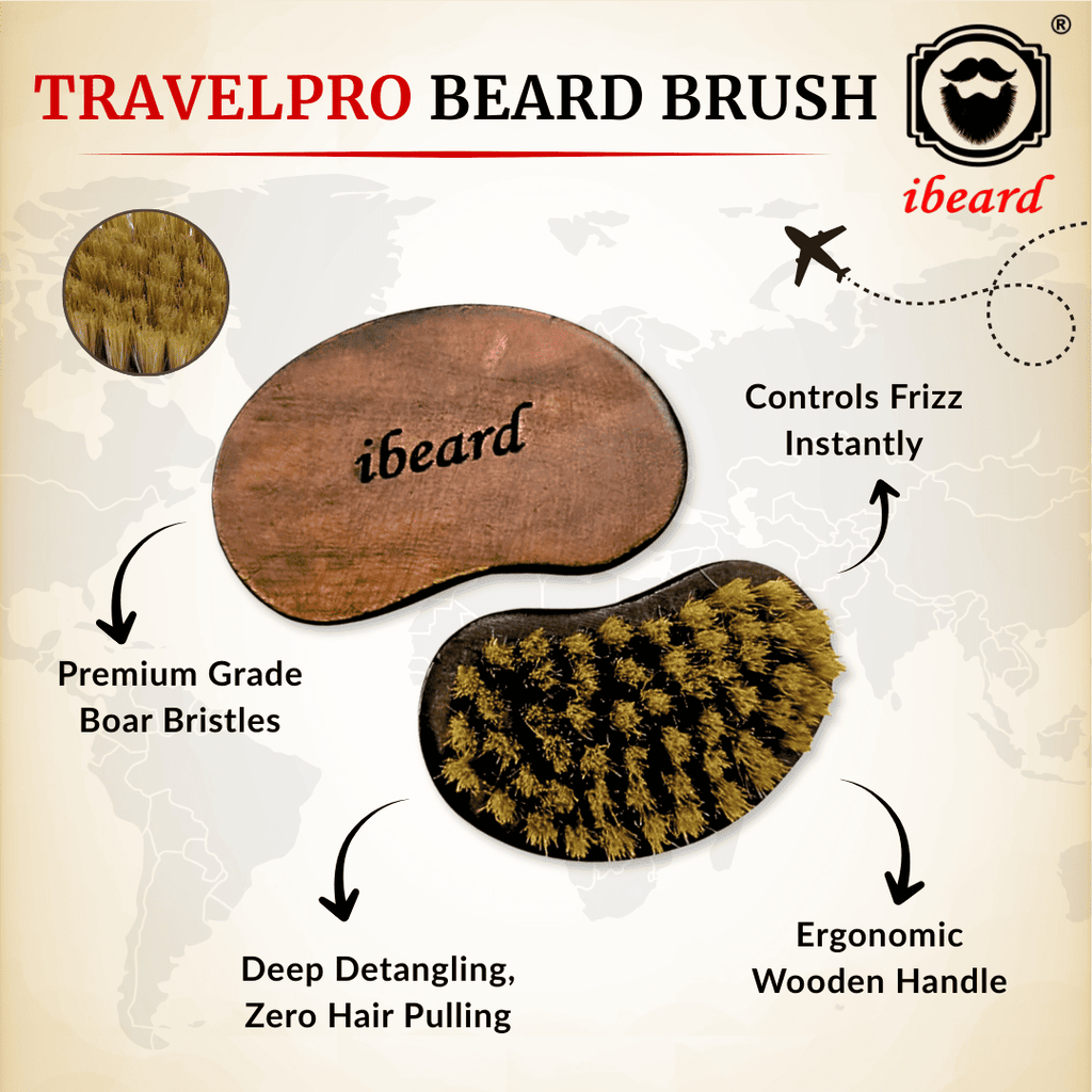 TravelPro beard brush with wooden handle and bristle head on a beige background, featuring the ibeard brand.