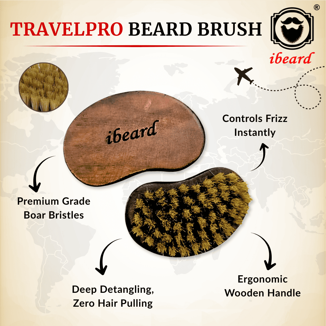 TravelPro beard brush with wooden handle and bristle head on a beige background, featuring the ibeard brand.